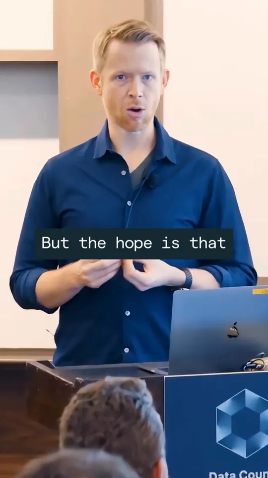 Short-form edit: speaker on stage with captions